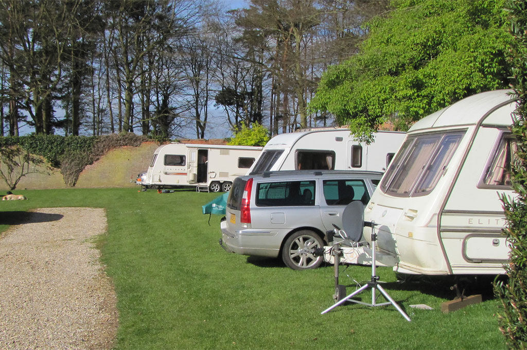 Orange caravan at Garden Caravan Site, Barmer, North-west Norfolk