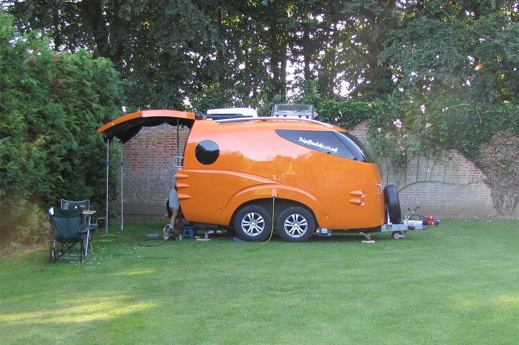 Orange caravan at Garden Caravan Site, Barmer, North-west Norfolk